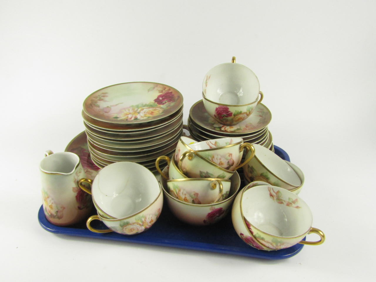 Appraisal: A Thomas porcelain Sevres tea service painted with flowers 'Dolumen'