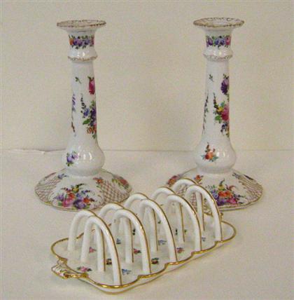 Appraisal: Pair of Dresden porcelain candlesticks Each with foliate and gilt