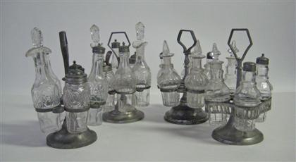 Appraisal: Pewter castor frame with bottles elijah braman taunton ma and