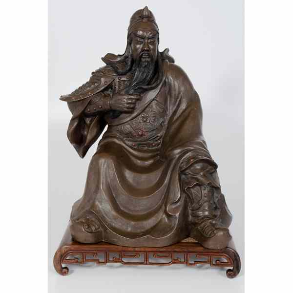 Appraisal: Chinese Yixing Warrior Chinese A large Yixing hollow cast seated