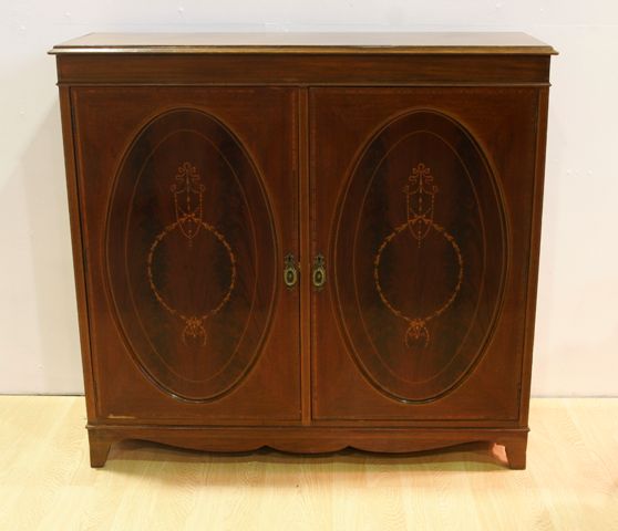 Appraisal: An Edwardian Sheraton revival mahogany and inlaid cabinet cm wide