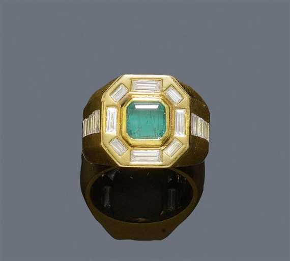 Appraisal: EMERALD AND DIAMOND RING Yellow gold Casual-elegant solid Chevali re