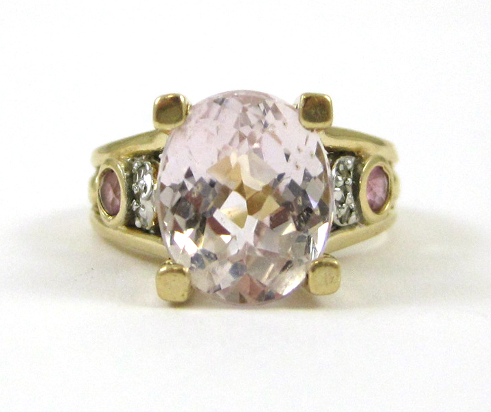 Appraisal: KUNZITE DIAMOND AND FOURTEEN KARAT GOLD RING featuring an oval