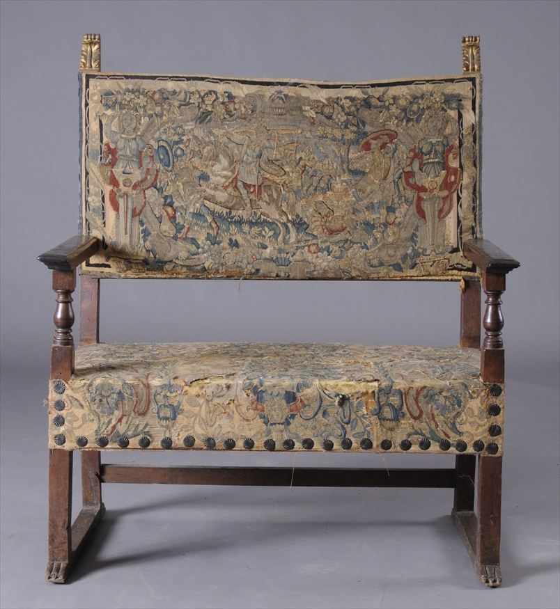 Appraisal: ITALIAN BAROQUE CARVED WALNUT AND PARCEL-GILT SETTEE WITH FLEMISH TAPESTRY