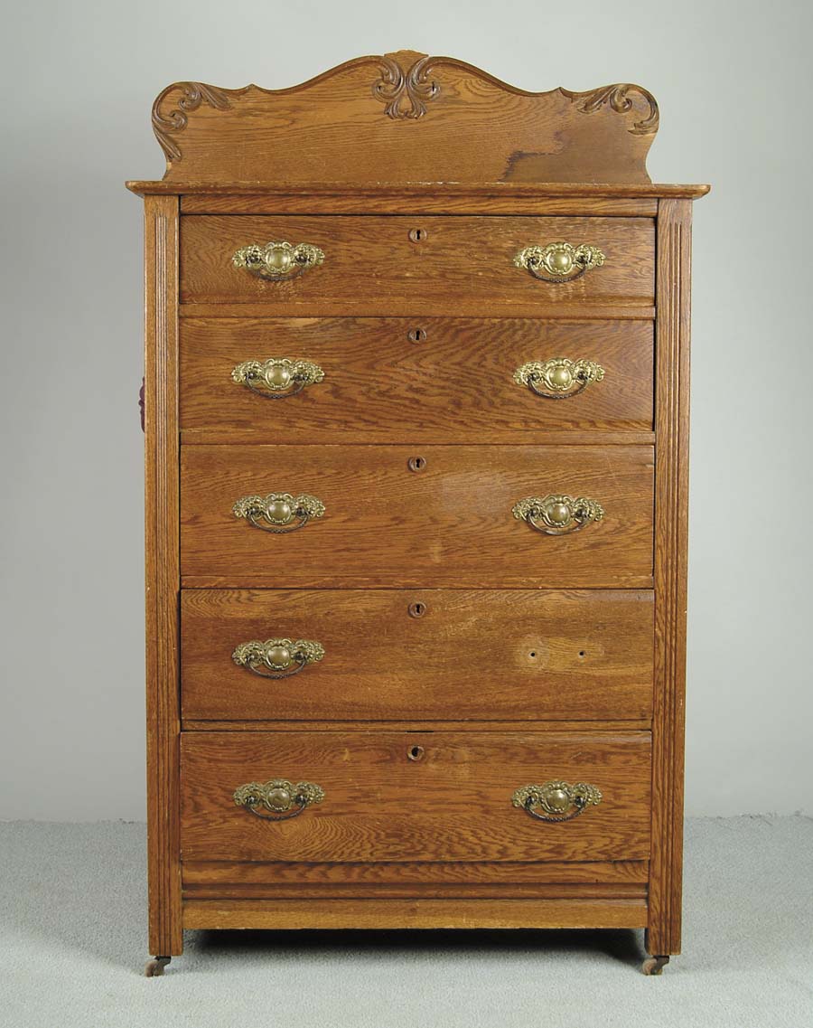 Appraisal: FIVE DRAWER OAK CHEST Decorative bale handles having carved backsplash