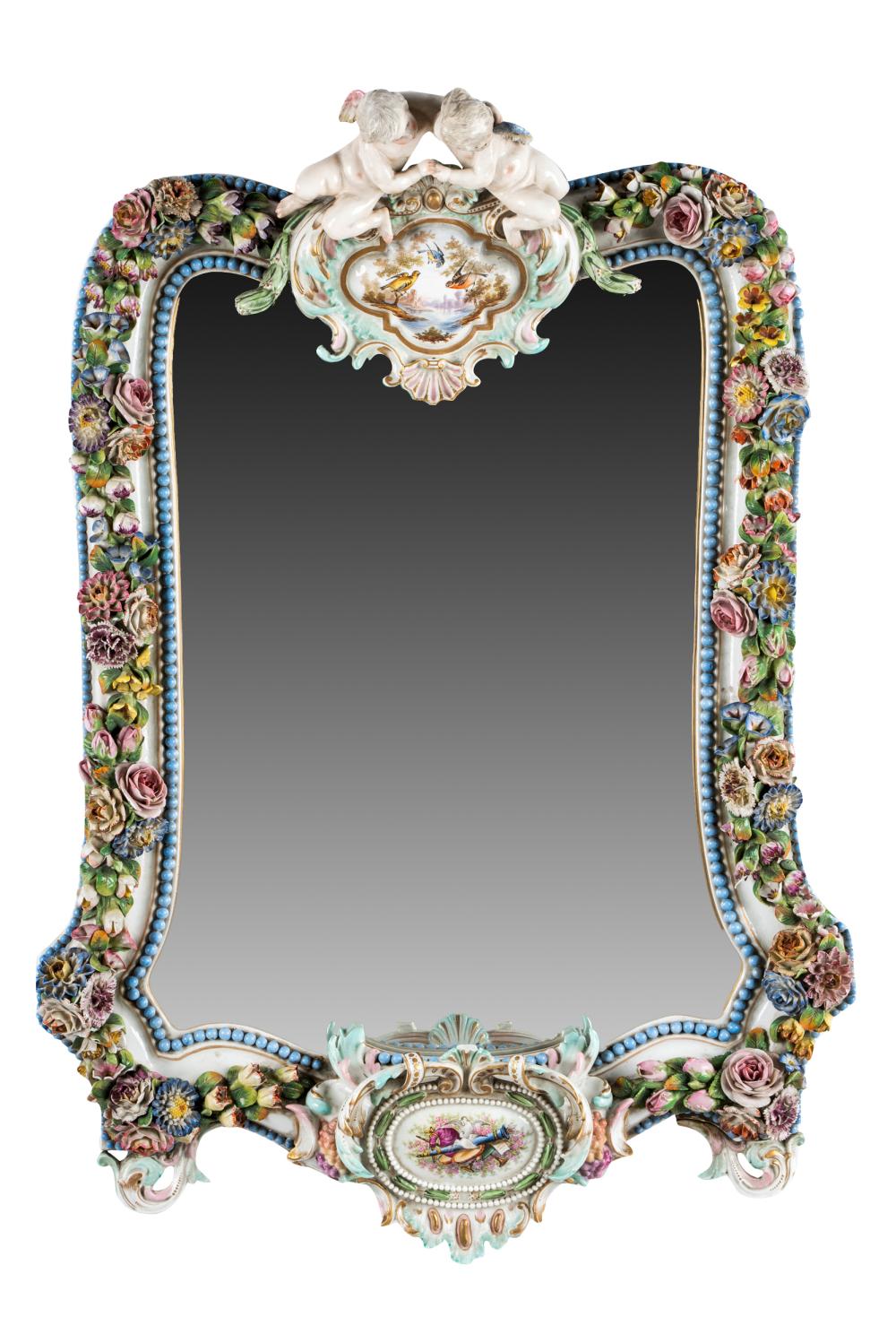 Appraisal: GERMAN PORCELAIN VANITY MIRRORblue crossed swords mark the surround encrusted