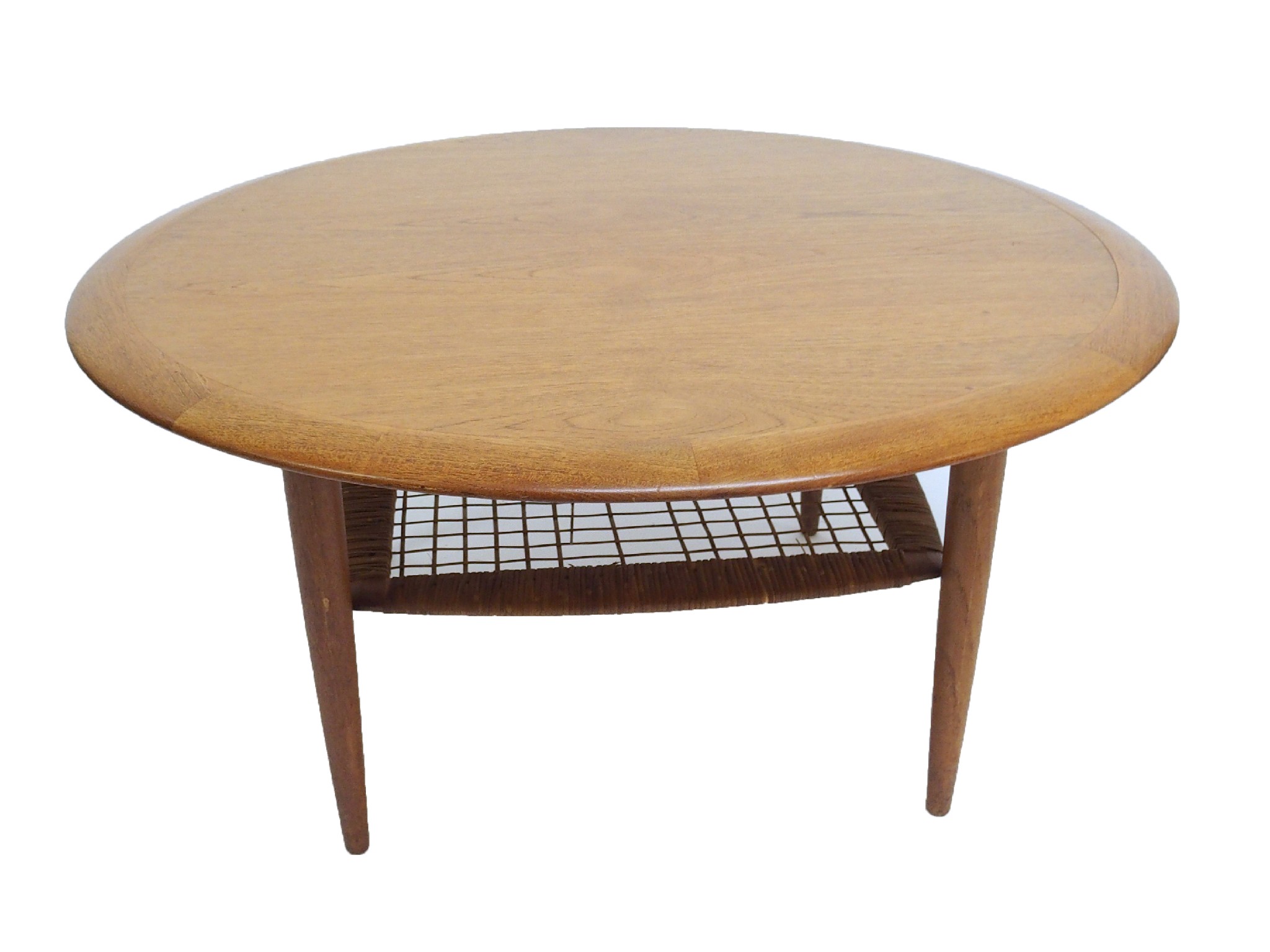 Appraisal: JOHANNES ANDERSON - a teak circular coffee table with cane