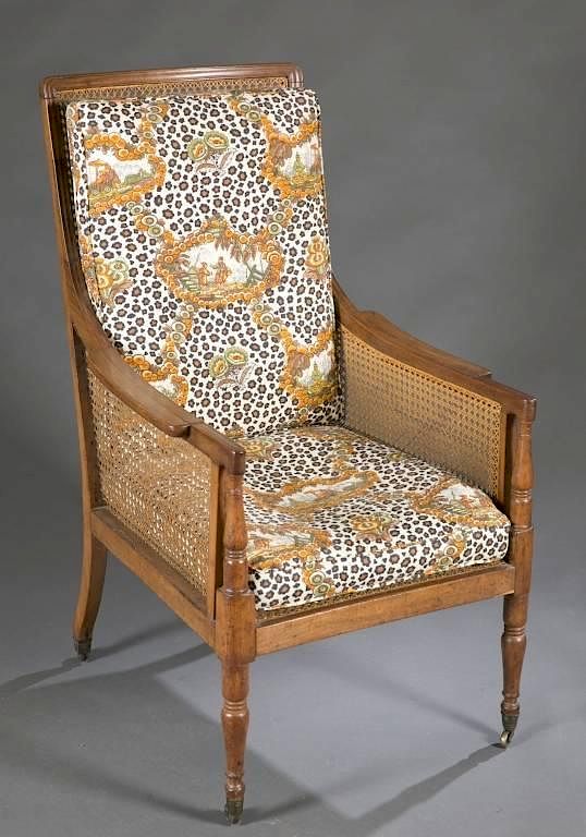 Appraisal: Wooden armchair with caned seat and back An English Regency