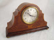 Appraisal: An eight day mantel clock in mahogany inlaid case with