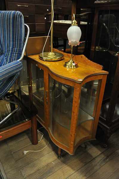 Appraisal: AN ART DECO DISPLAY CABINET WITH SERPENTINE FRONT key in