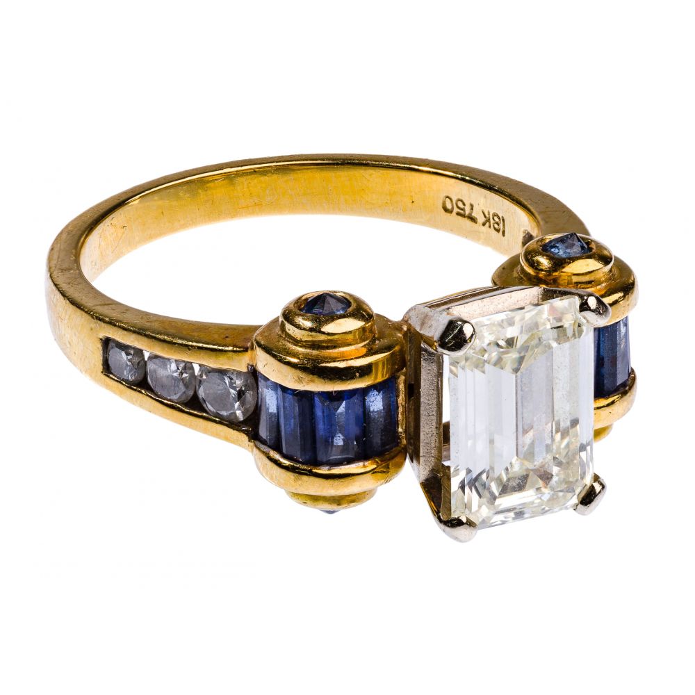 Appraisal: K YELLOW GOLD SAPPHIRE AND DIAMOND RINGHaving an emerald cut