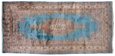 Appraisal: Crown Kerman carpet elaborate central floral medallion on medium blue