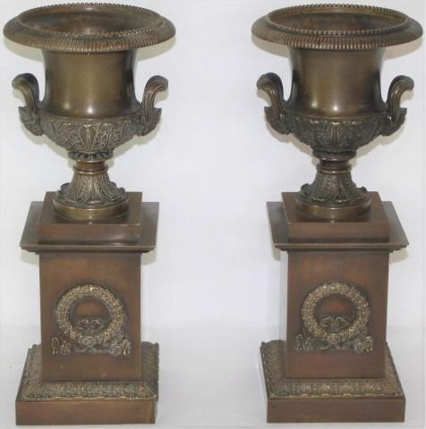 Appraisal: PAIR OF TH CENTURY FRENCH BRONZE CLASSICALURNS RAM S HEAD