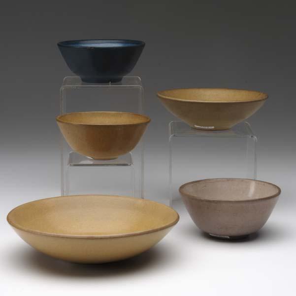 Appraisal: MARBLEHEAD Five bowls covered in matte mustard blue and beige