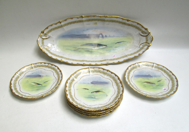 Appraisal: SEVEN PIECE ELITE WORKS LIMOGES FISH SET serving platter by