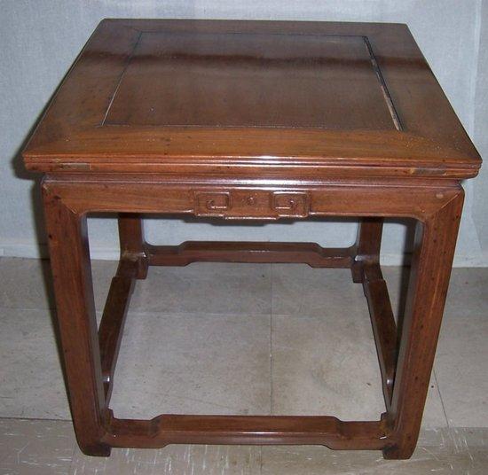 Appraisal: A pair of Chinese hardwood occasional tables with panelled square