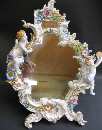 Appraisal: A GERMAN PORCELAIN FRAMED MIRROR the frame hand enameled white