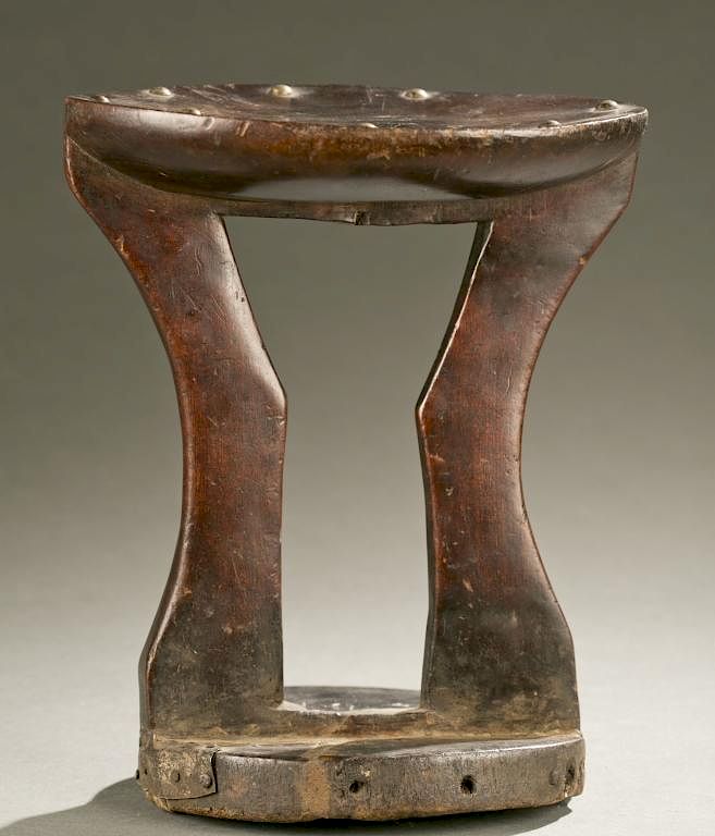 Appraisal: DRC wooden stool th c A wooden stool with tack