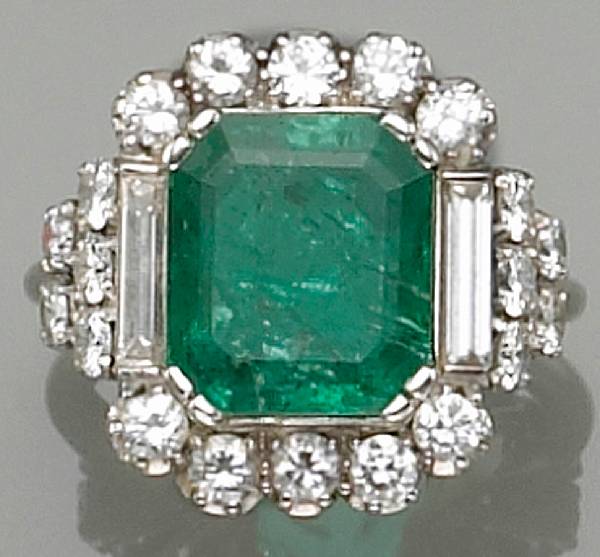 Appraisal: An emerald diamond and platinum ring emerald weighing an estimated