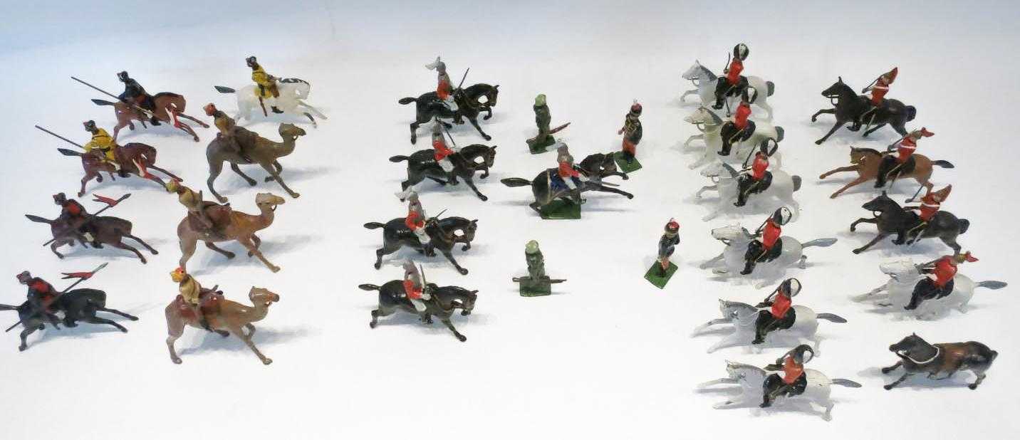 Appraisal: TWENTY-EIGHT BRITAIN'S LTD TOY SOLDIERS including a boxed set of