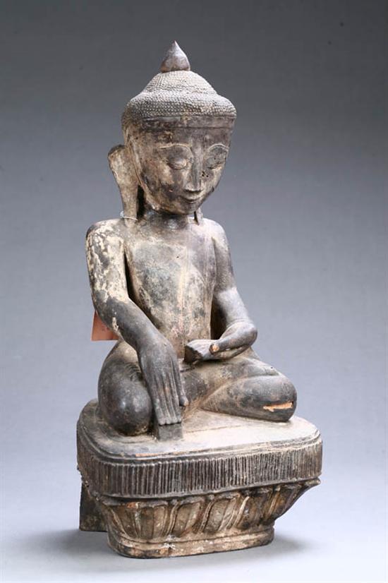 Appraisal: SEATED BUDDHA Asian th century hardwood Seated on a lotus