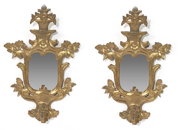 Appraisal: Each with shaped mirror plate and flower filled urn form