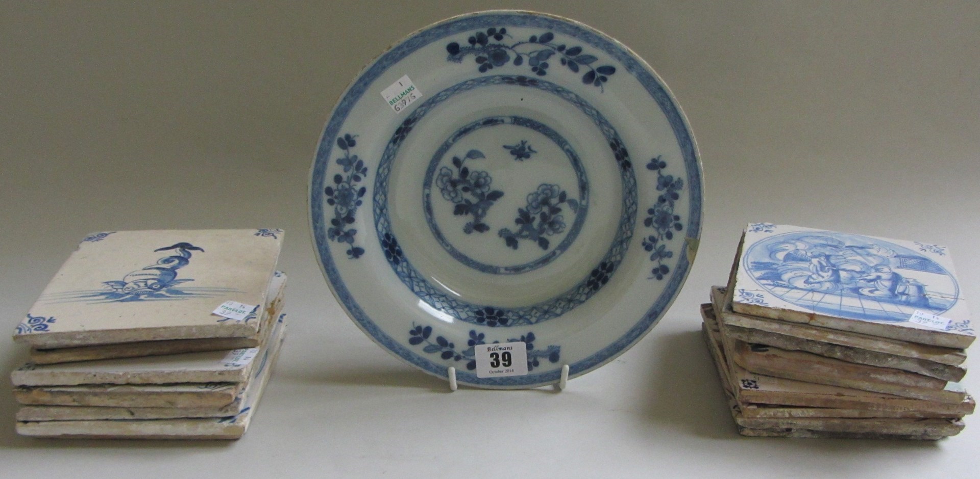 Appraisal: A group of seventeen English and Dutch Delft tiles mostly