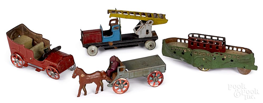 Appraisal: Four tin lithograph penny toys Four tin lithograph Universal Theatres