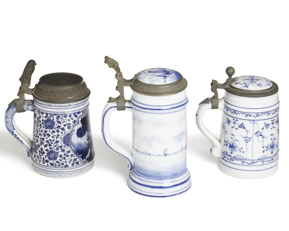 Appraisal: Three Delft-style steins Late th early th Century One signed