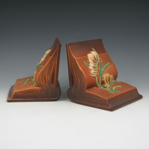 Appraisal: Pair of brown Roseville Freesia bookends Marked Roseville USA Mint