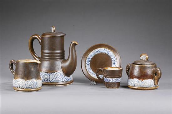 Appraisal: THIRTEEN PIECE QUIMPER TEA SET Art Deco set with brown