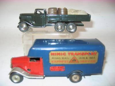 Appraisal: Two Minic clockwork tinplate toys comprising Express Service van in