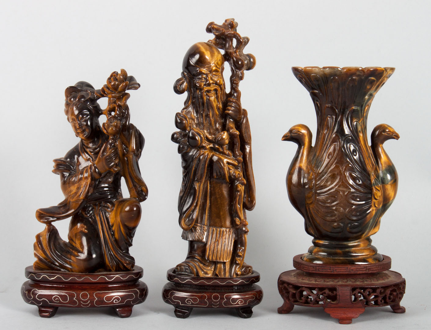 Appraisal: Three Chinese carved tiger's-eye articles comprising two figures of immortals