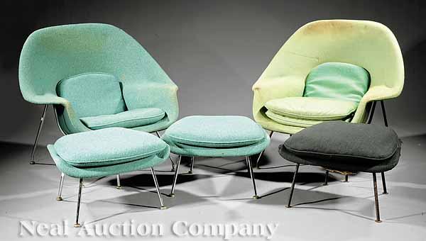 Appraisal: A Pair of Eero Saarinen Womb Chairs and Matching Ottomans