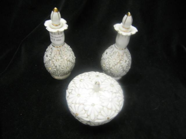 Appraisal: Pair of Porcelain Perfume Bottles with matching powder jar