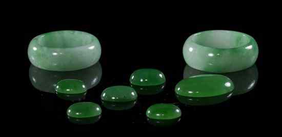 Appraisal: A Pair of Jadeite Rings of apple green and white