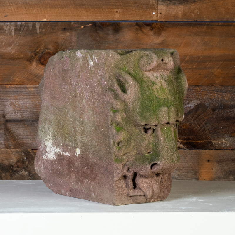 Appraisal: CARVED STONE KEYSTONE OF A PROUD LION x x in