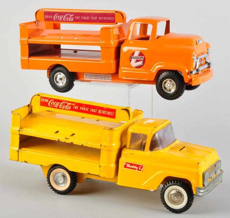 Appraisal: Lot of Coca-Cola Toy Trucks Description Includes one Moline reproduction