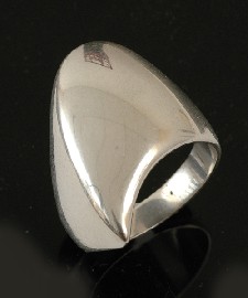 Appraisal: A silver ring by Georg Jensen Of asymetrical abstract design