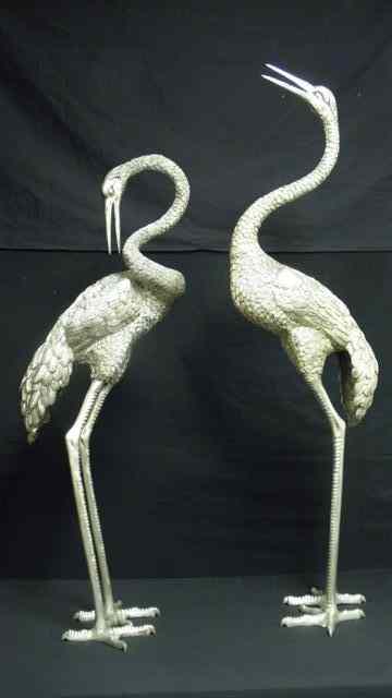 Appraisal: Pair of sculptures depicting Egrets What appears to be platinum