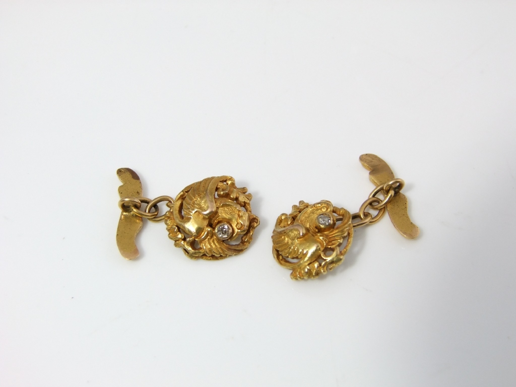 Appraisal: A pair of French ct gold cufflinks with mythical bird