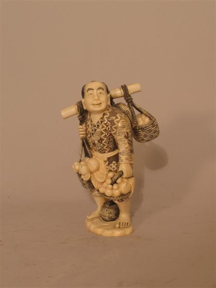 Appraisal: Japanese Carved Figure of Fruit Seller H in