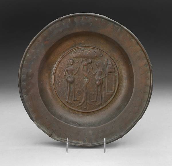 Appraisal: A German repousse decorated alms dish probably Nuremberg th century