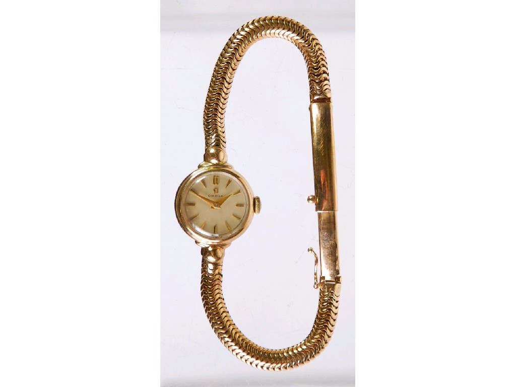 Appraisal: LADY'S ct GOLD OMEGA WRIST WATCH with circular silvered dial