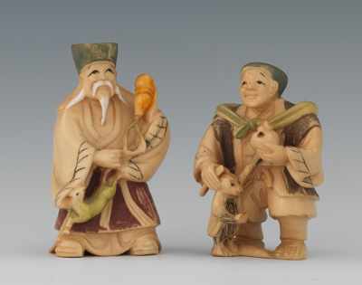 Appraisal: Two Polychrome Painted Ivory Netsuke The first a smiling man