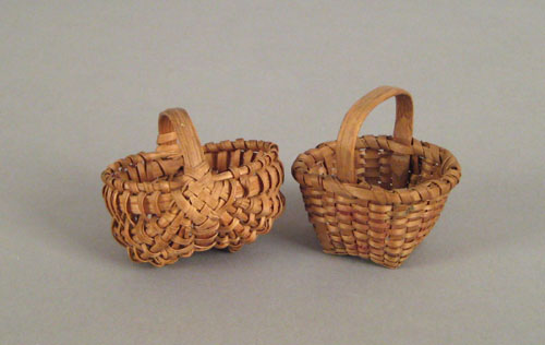 Appraisal: Two miniature splint oak baskets th c to include a