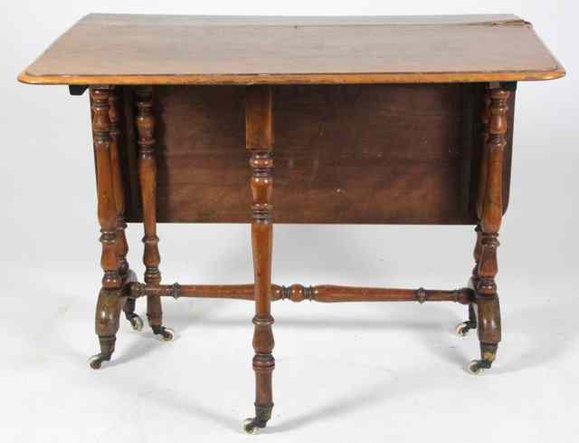 Appraisal: A Victorian mahogany Sutherland table on twin turned baluster legs