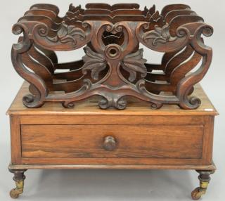 Appraisal: Rosewood Victorian canterbury with pierce work separators and one drawer