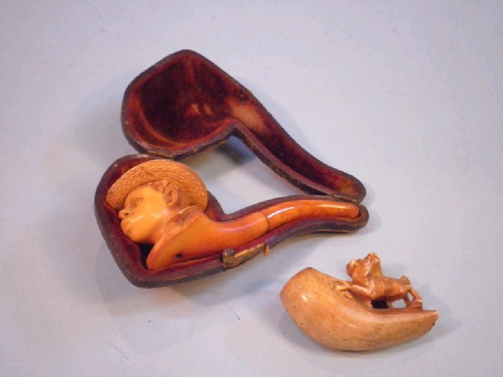 Appraisal: An thC carved meerschaum pipe in the form of a