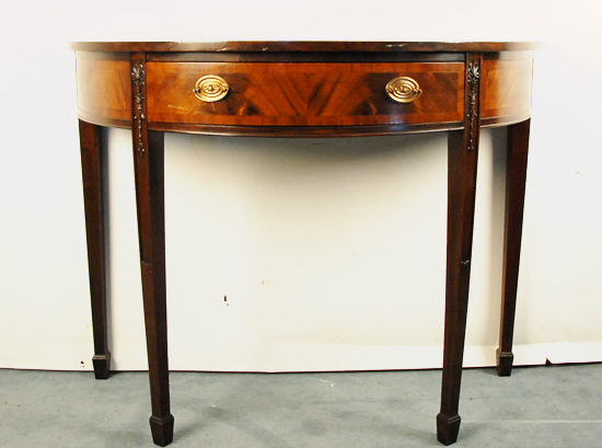 Appraisal: An English th C Mahogany Demilune Table with drawer lined